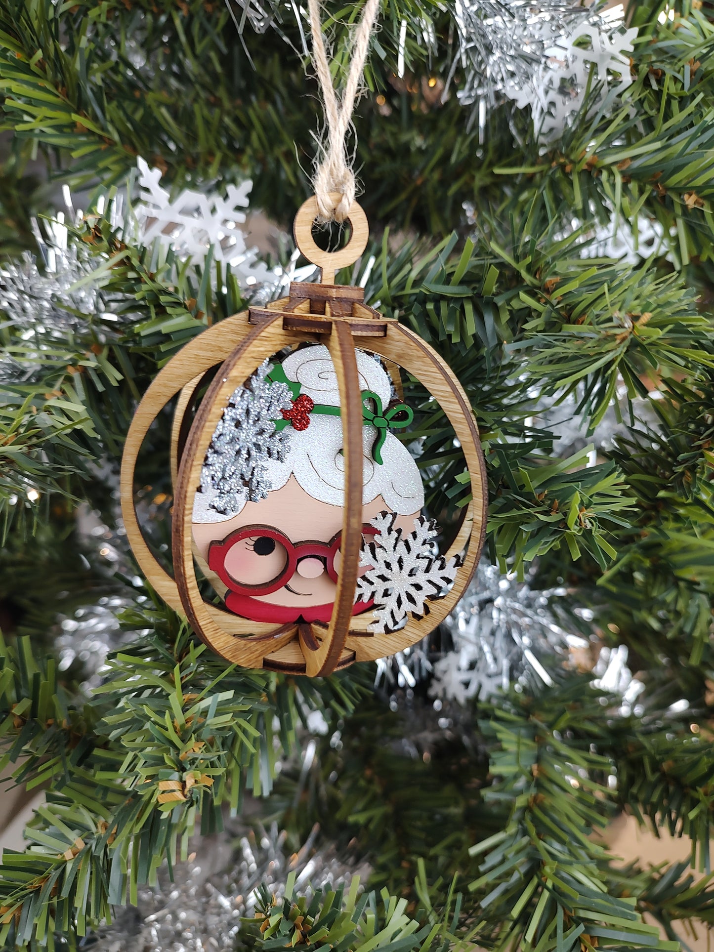 Mrs. Claus snow globe ornament