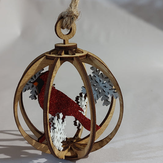 Red cardinal snow globe ornament